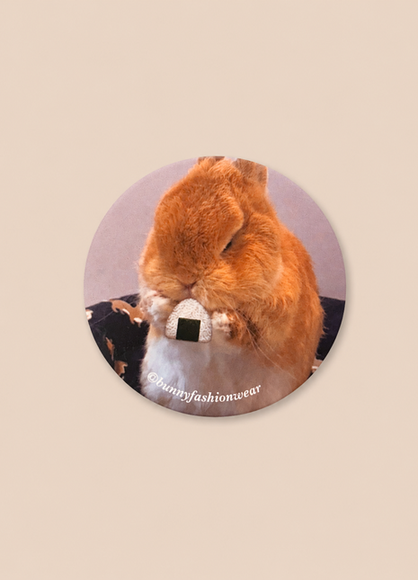 Eggie Eating Onigiri Pin back badge, Matte finish