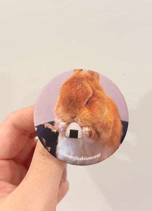 Eggie Eating Onigiri Pin back badge, Matte finish